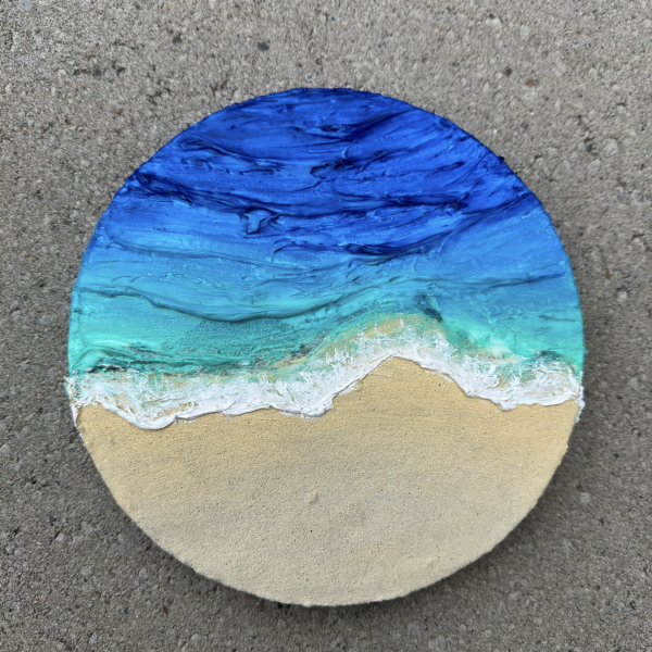 Textured Waves on Sandy Shore